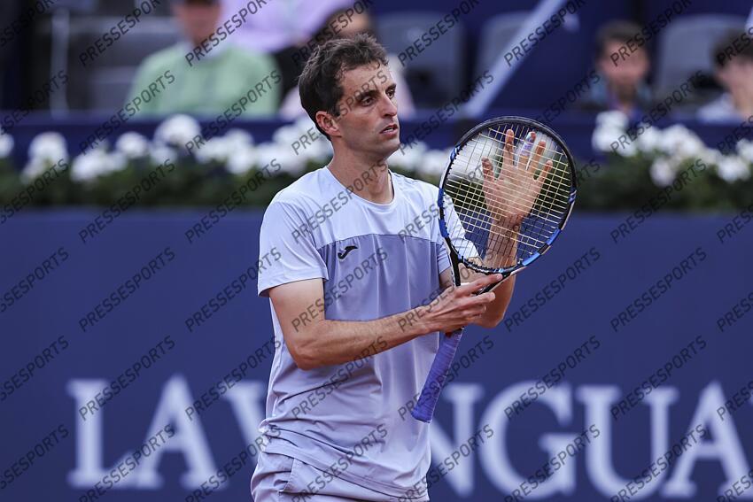 Albert Ramos-Vinolas of Spain in actions against Holge Rune of Denmark during the first round tennis match of the Barcelona Open Banc Sabadell - Conde Godo 2025 Day 1 at Real Club De Tenis Barcelona on April 14, 2025 in Barcelona, Spain. OPEN DE BARCELONE 