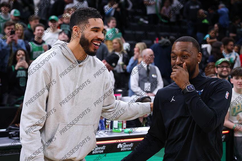 Apr 13, 2025; Boston, Massachusetts, USA; Boston Celtics forward Jayson Tatum (0) talks to Charlotte Hornets coach Kemba Walker after a game at TD Garden. Mandatory Credit: Paul Rutherford-Imagn Images NBA: Charlotte Hornets at Boston Celtics 