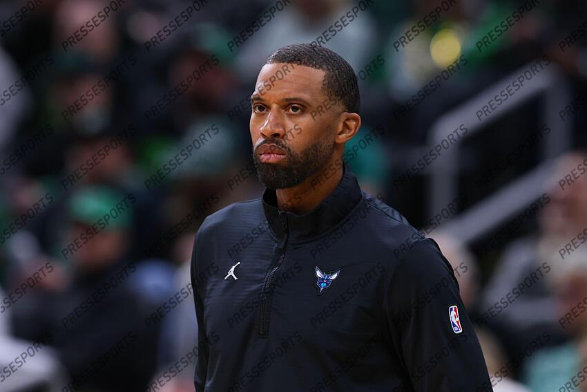 Apr 13, 2025; Boston, Massachusetts, USA; Charlotte Hornets head coach Charles Lee reacts during the first half against the Boston Celtics at TD Garden. Mandatory Credit: Paul Rutherford-Imagn Images NBA: Charlotte Hornets at Boston Celtics 