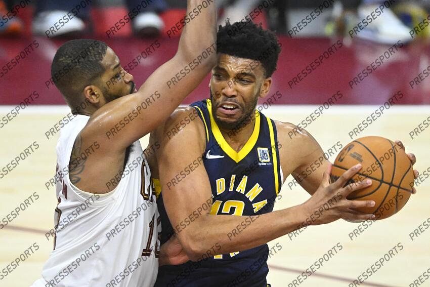 Apr 13, 2025; Cleveland, Ohio, USA; Cleveland Cavaliers center Tristan Thompson (13) defends Indiana Pacers center Tony Bradley (13) in the third quarter at Rocket Arena. Mandatory Credit: David Richard-Imagn Images NBA: Indiana Pacers at Cleveland Cavaliers 