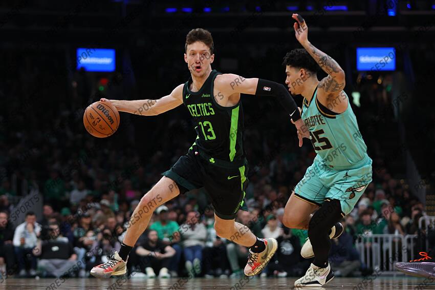 Apr 13, 2025; Boston, Massachusetts, USA; Boston Celtics forward Drew Peterson (13) dribbles down the court during the first half against the Charlotte Hornets at TD Garden. Mandatory Credit: Paul Rutherford-Imagn Images NBA: Charlotte Hornets at Boston Celtics 