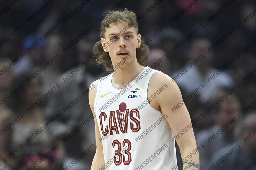 Apr 13, 2025; Cleveland, Ohio, USA; Cleveland Cavaliers guard Luke Travers (33) stands on the court in the first quarter against the Indiana Pacers at Rocket Arena. Mandatory Credit: David Richard-Imagn Images NBA: Indiana Pacers at Cleveland Cavaliers 
