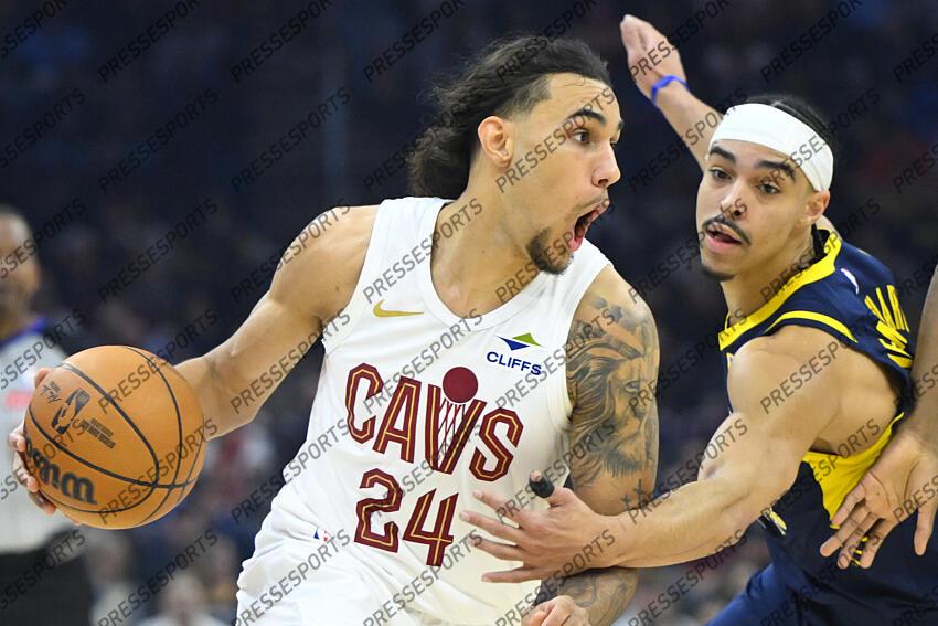 Apr 13, 2025; Cleveland, Ohio, USA; Cleveland Cavaliers forward Jaylon Tyson (24) dribbles beside Indiana Pacers guard Andrew Nembhard (2) in the first quarter at Rocket Arena. Mandatory Credit: David Richard-Imagn Images NBA: Indiana Pacers at Cleveland Cavaliers 