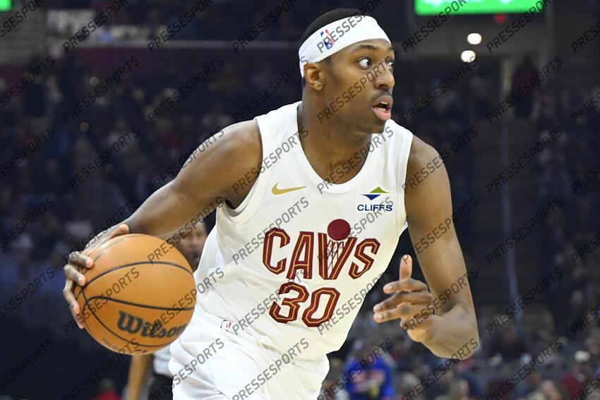 Apr 13, 2025; Cleveland, Ohio, USA; Cleveland Cavaliers forward Nae'Qwan Tomlin (30) dribbles in the first quarter against the Indiana Pacers at Rocket Arena. Mandatory Credit: David Richard-Imagn Images NBA: Indiana Pacers at Cleveland Cavaliers 