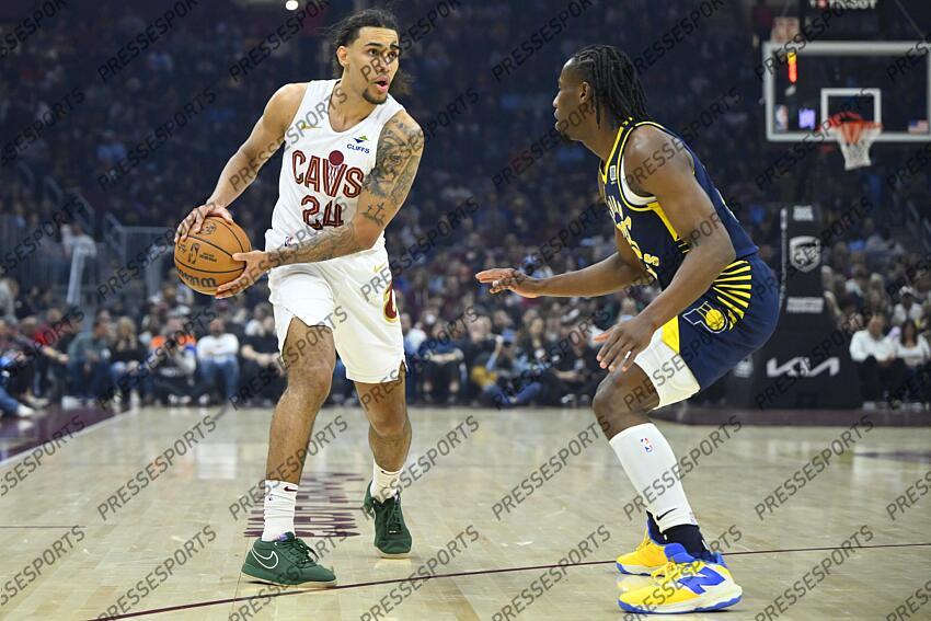 Apr 13, 2025; Cleveland, Ohio, USA; Cleveland Cavaliers forward Jaylon Tyson (24) looks to pass beside Indiana Pacers forward Aaron Nesmith (23) in the first quarter at Rocket Arena. Mandatory Credit: David Richard-Imagn Images NBA: Indiana Pacers at Cleveland Cavaliers 