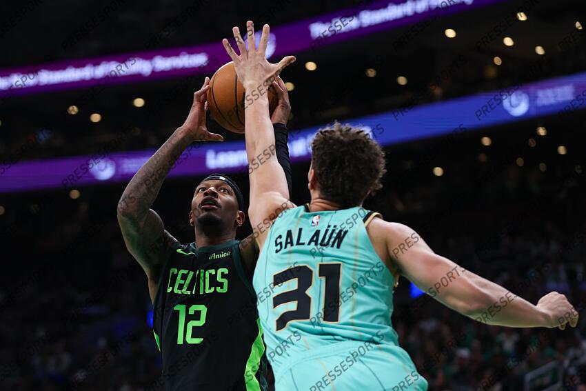 Apr 13, 2025; Boston, Massachusetts, USA; Boston Celtics forward Torrey Craig (12) shoots during the first half against the Charlotte Hornets at TD Garden. Mandatory Credit: Paul Rutherford-Imagn Images NBA: Charlotte Hornets at Boston Celtics 