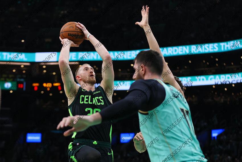 Apr 13, 2025; Boston, Massachusetts, USA; Boston Celtics forward Sam Hauser (30) shoots during the first half against the Charlotte Hornets at TD Garden. Mandatory Credit: Paul Rutherford-Imagn Images NBA: Charlotte Hornets at Boston Celtics 