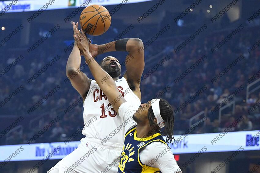 Apr 13, 2025; Cleveland, Ohio, USA; Cleveland Cavaliers center Tristan Thompson (13) shoots beside Indiana Pacers center Myles Turner (33) in the first quarter at Rocket Arena. Mandatory Credit: David Richard-Imagn Images NBA: Indiana Pacers at Cleveland Cavaliers 