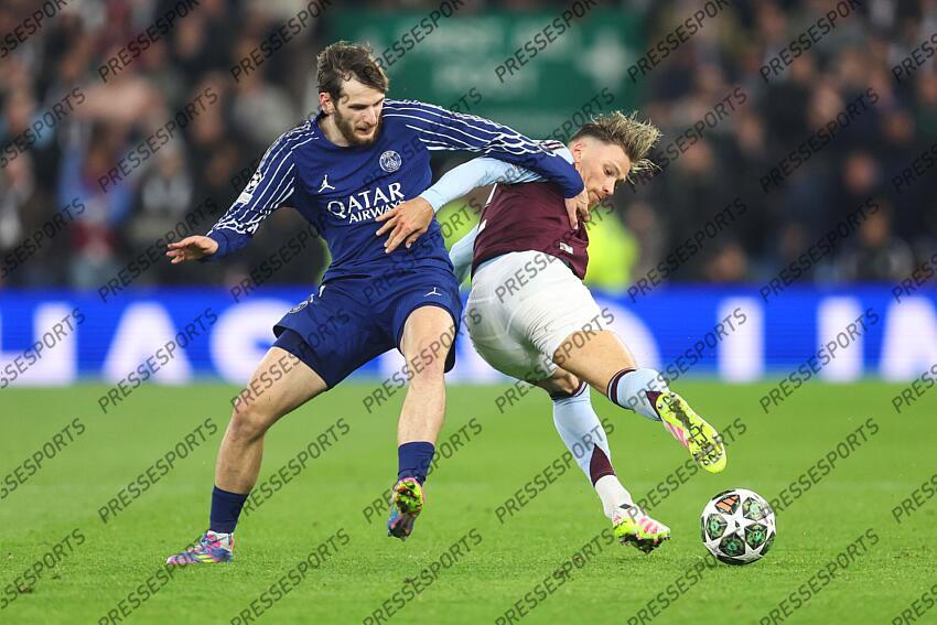 15 April 2025, Aston - Champions League Football, Quarter-Final, Second Leg - Aston Villa v Paris Saint-Germain - Khvicha Kvaratskhelia of PSG and Matty Cash of Aston Villa - Photo: Charlotte Wilson / Offside. ASTON VILLA-PSG (3-2) 