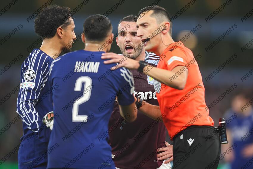 15 April 2025, Aston - Champions League Football, Quarter-Final, Second Leg - Aston Villa v Paris Saint-Germain - John McGinn of Aston Villa argues with Achraf Hakimi of PSG - Photo: Charlotte Wilson / Offside. ASTON VILLA-PSG (3-2) 