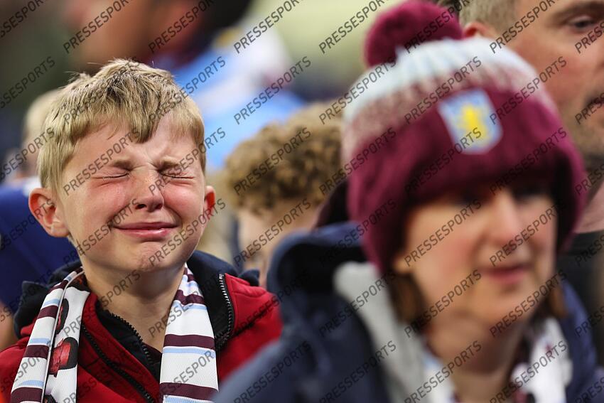 15 April 2025, Aston - Champions League Football, Quarter-Final, Second Leg - Aston Villa v Paris Saint-Germain - A young Aston Villa fan cries after his team loses - Photo: Charlotte Wilson / Offside. ASTON VILLA-PSG (3-2) 