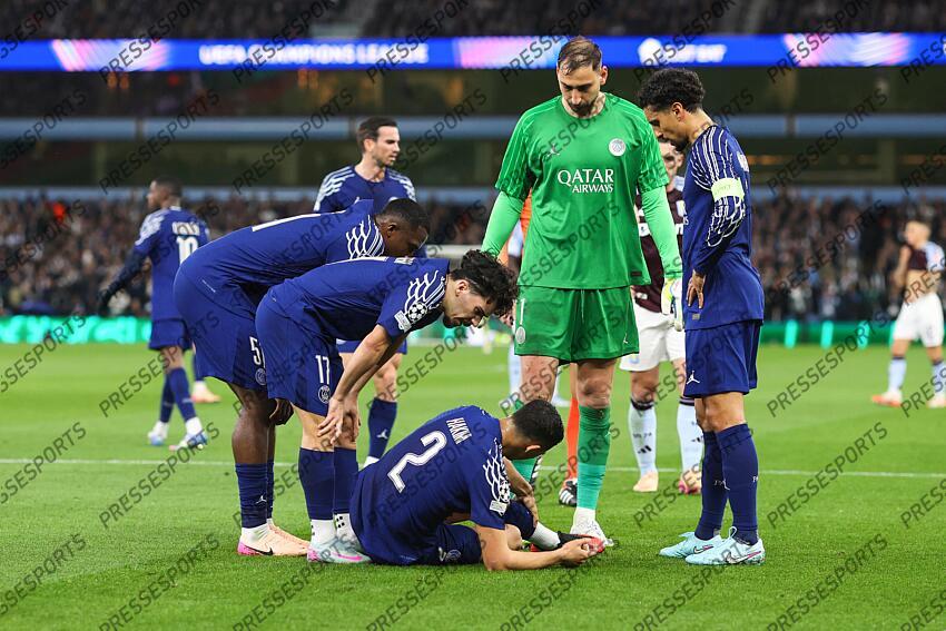 15 April 2025, Aston - Champions League Football, Quarter-Final, Second Leg - Aston Villa v Paris Saint-Germain - Achraf Hakimi of PSG goes down injured - Photo: Charlotte Wilson / Offside. ASTON VILLA-PSG (3-2) 