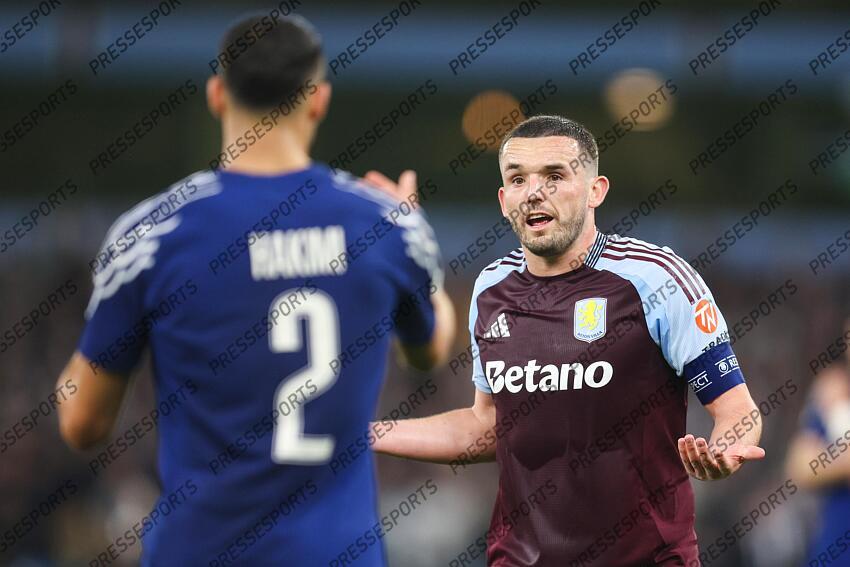 15 April 2025, Aston - Champions League Football, Quarter-Final, Second Leg - Aston Villa v Paris Saint-Germain - John McGinn of Aston Villa argues with Achraf Hakimi of PSG - Photo: Charlotte Wilson / Offside. ASTON VILLA-PSG (3-2) 