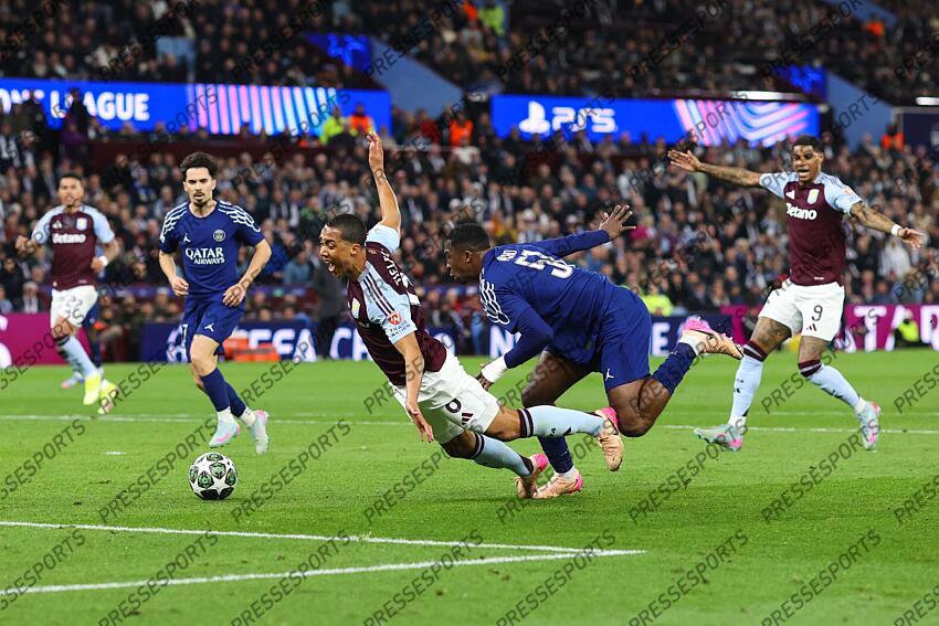 15 April 2025, Aston - Champions League Football, Quarter-Final, Second Leg - Aston Villa v Paris Saint-Germain - Willian Pacho of PSG trips Youri Tielemans of Aston Villa - Photo: Charlotte Wilson / Offside. ASTON VILLA-PSG (3-2) 