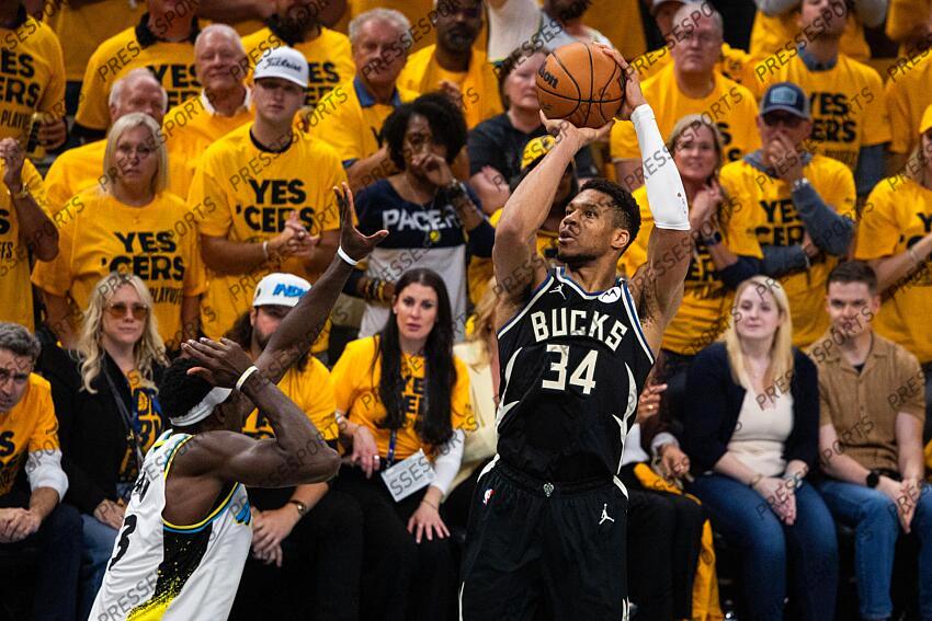 Apr 29, 2025; Indianapolis, Indiana, USA; Milwaukee Bucks forward Giannis Antetokounmpo (34) shoots the ball while Indiana Pacers forward Pascal Siakam (43) defends during game five of the first round for the 2024 NBA Playoffs at Gainbridge Fieldhouse. Mandatory Credit: Trevor Ruszkowski-Imagn Images NBA: Playoffs-Milwaukee Bucks at Indiana Pacers 