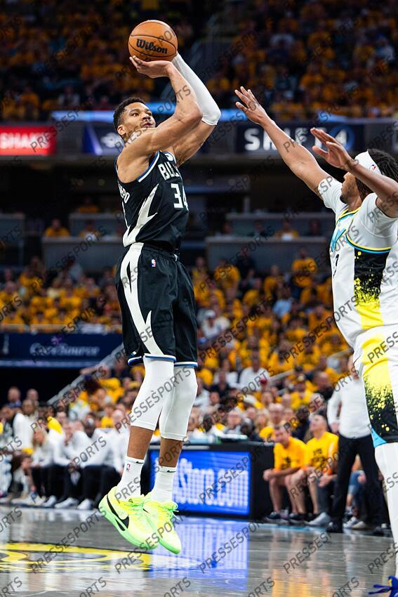 Apr 29, 2025; Indianapolis, Indiana, USA; Milwaukee Bucks forward Giannis Antetokounmpo (34) shoots the ball while Indiana Pacers center Myles Turner (33) defends during game five of the first round for the 2024 NBA Playoffs at Gainbridge Fieldhouse. Mandatory Credit: Trevor Ruszkowski-Imagn Images NBA: Playoffs-Milwaukee Bucks at Indiana Pacers 