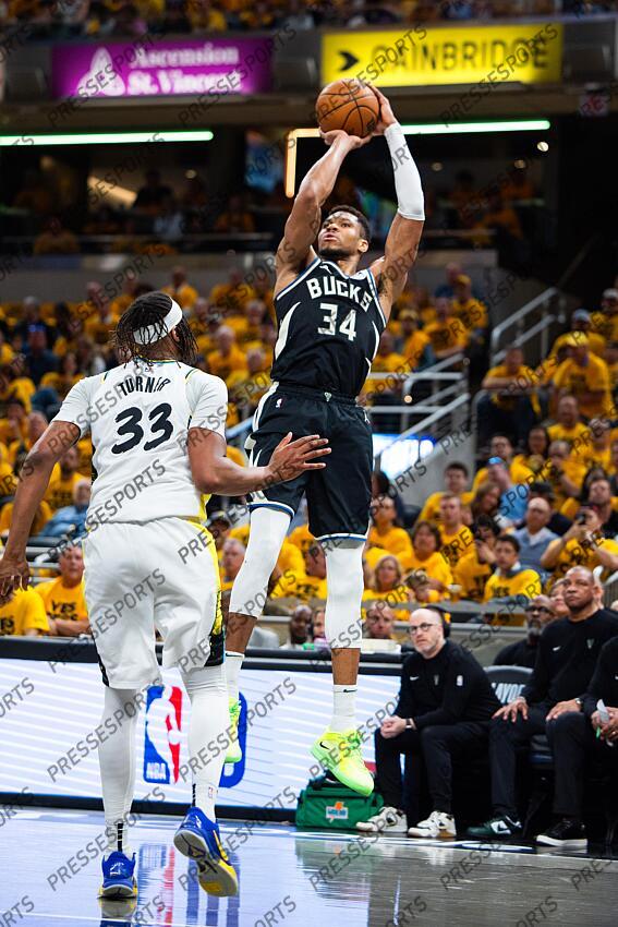 Apr 29, 2025; Indianapolis, Indiana, USA; Milwaukee Bucks forward Giannis Antetokounmpo (34) shoots the ball while Indiana Pacers center Myles Turner (33) defends during game five of the first round for the 2024 NBA Playoffs at Gainbridge Fieldhouse. Mandatory Credit: Trevor Ruszkowski-Imagn Images NBA: Playoffs-Milwaukee Bucks at Indiana Pacers 