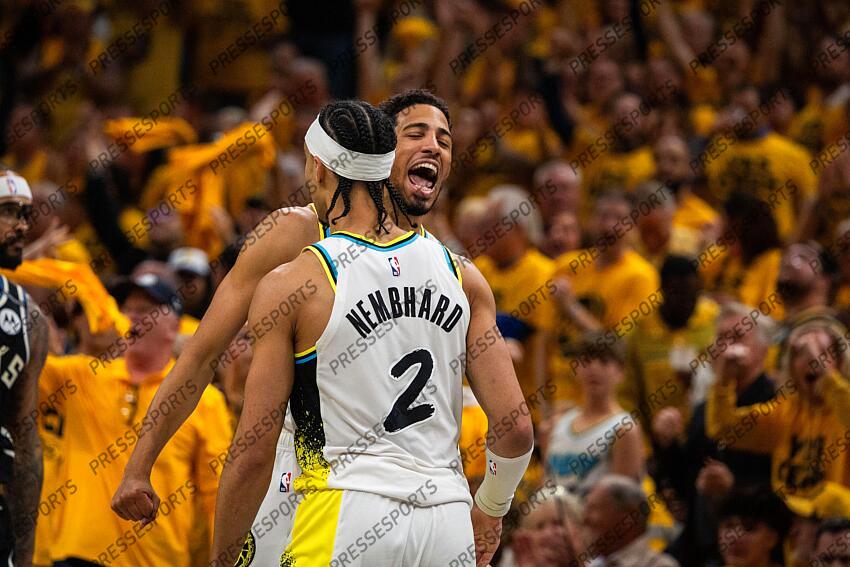 Apr 29, 2025; Indianapolis, Indiana, USA; Indiana Pacers guard Andrew Nembhard (2) celebrates a made basket with guard Tyrese Haliburton (0) during game five of the first round for the 2024 NBA Playoffs against the Milwaukee Bucks at Gainbridge Fieldhouse. Mandatory Credit: Trevor Ruszkowski-Imagn Images NBA: Playoffs-Milwaukee Bucks at Indiana Pacers 