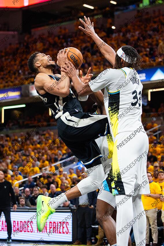 Apr 29, 2025; Indianapolis, Indiana, USA; Milwaukee Bucks forward Giannis Antetokounmpo (34) shoots the ball while Indiana Pacers center Myles Turner (33) defends during game five of the first round for the 2024 NBA Playoffs at Gainbridge Fieldhouse. Mandatory Credit: Trevor Ruszkowski-Imagn Images NBA: Playoffs-Milwaukee Bucks at Indiana Pacers 