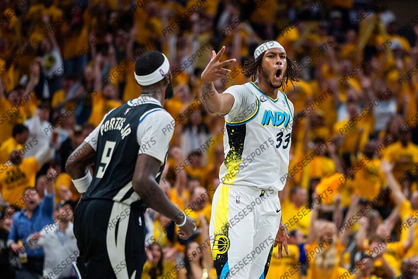 Apr 29, 2025; Indianapolis, Indiana, USA; Indiana Pacers center Myles Turner (33) celebrates a made basket during game five of the first round for the 2024 NBA Playoffs against the Milwaukee Bucks at Gainbridge Fieldhouse. Mandatory Credit: Trevor Ruszkowski-Imagn Images NBA: Playoffs-Milwaukee Bucks at Indiana Pacers 