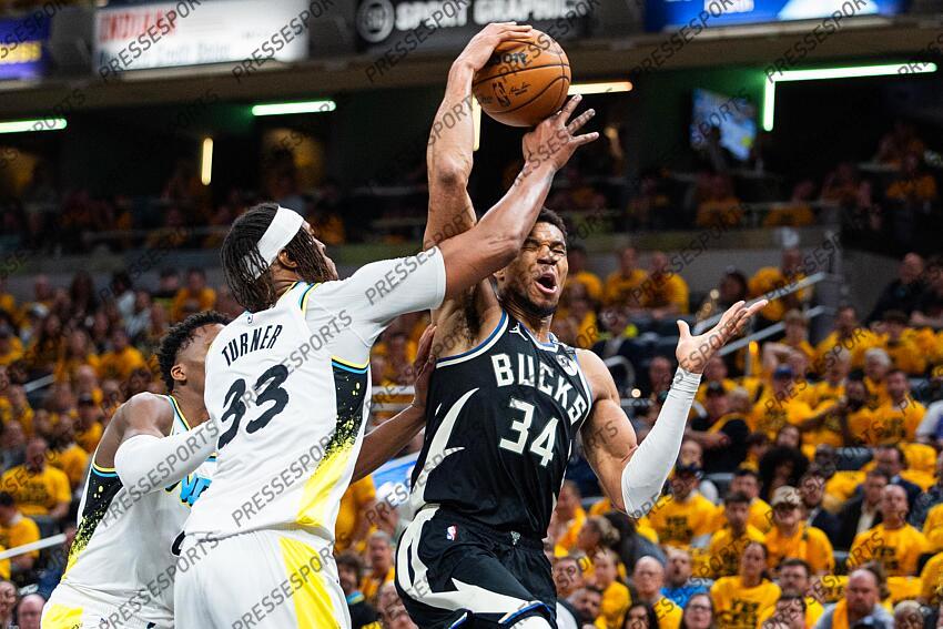 Apr 29, 2025; Indianapolis, Indiana, USA; Milwaukee Bucks forward Giannis Antetokounmpo (34) shoots the ball while Indiana Pacers center Myles Turner (33) defends during game five of the first round for the 2024 NBA Playoffs at Gainbridge Fieldhouse. Mandatory Credit: Trevor Ruszkowski-Imagn Images NBA: Playoffs-Milwaukee Bucks at Indiana Pacers 