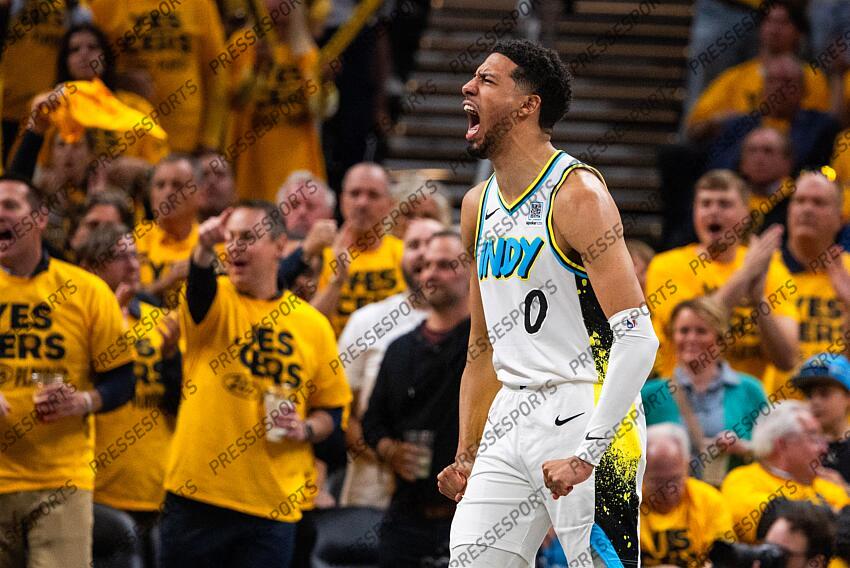 Apr 29, 2025; Indianapolis, Indiana, USA; Indiana Pacers guard Tyrese Haliburton (0) reacts during a time out during game five of the first round for the 2024 NBA Playoffs against the Milwaukee Bucks at Gainbridge Fieldhouse. Mandatory Credit: Trevor Ruszkowski-Imagn Images NBA: Playoffs-Milwaukee Bucks at Indiana Pacers 