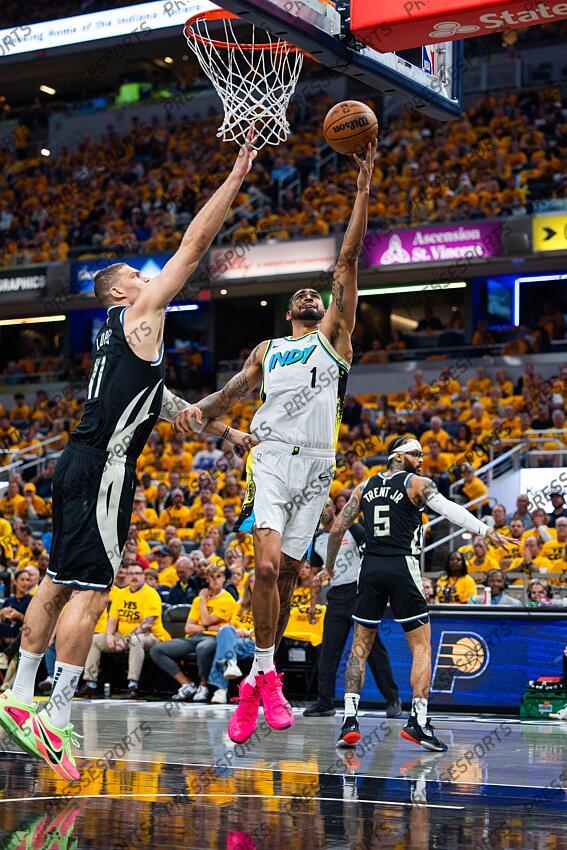 Apr 29, 2025; Indianapolis, Indiana, USA; Indiana Pacers forward Obi Toppin (1) shoots the ball while Milwaukee Bucks center Brook Lopez (11) defends during game five of the first round for the 2024 NBA Playoffs at Gainbridge Fieldhouse. Mandatory Credit: Trevor Ruszkowski-Imagn Images NBA: Playoffs-Milwaukee Bucks at Indiana Pacers 