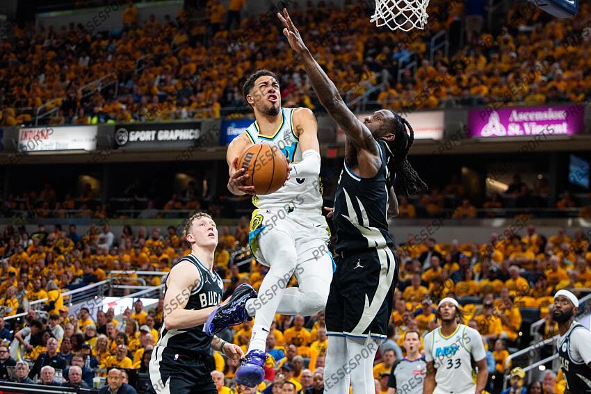 Apr 29, 2025; Indianapolis, Indiana, USA; Indiana Pacers guard Tyrese Haliburton (0) shoots the ball while Milwaukee Bucks forward Taurean Prince (12) defends during game five of the first round for the 2024 NBA Playoffs at Gainbridge Fieldhouse. Mandatory Credit: Trevor Ruszkowski-Imagn Images NBA: Playoffs-Milwaukee Bucks at Indiana Pacers 