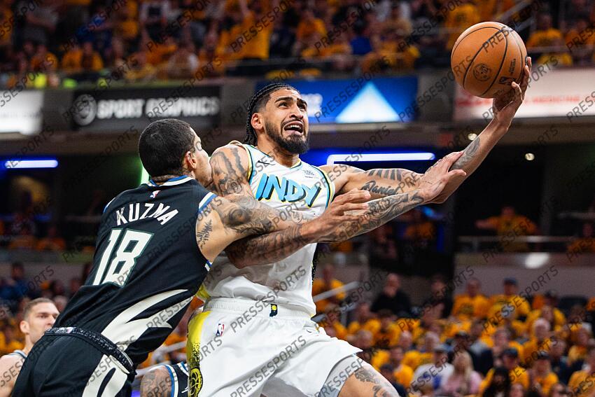 Apr 29, 2025; Indianapolis, Indiana, USA; Indiana Pacers forward Obi Toppin (1) shoots the ball while Milwaukee Bucks forward Kyle Kuzma (18) defends during game five of the first round for the 2024 NBA Playoffs at Gainbridge Fieldhouse. Mandatory Credit: Trevor Ruszkowski-Imagn Images NBA: Playoffs-Milwaukee Bucks at Indiana Pacers 