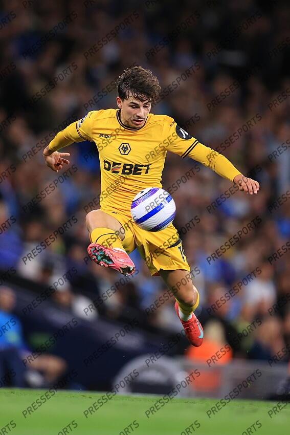 2nd May 2025 - Premier League - Manchester City v Wolverhampton Wanderers - Rodrigo Gomes of Wolverhampton Wanderers leaps to control the ball - Photo: Simon Stacpoole / Offside. MANCHESTER CITY-WOLVERHAMPTON WANDERERS (1-0) 