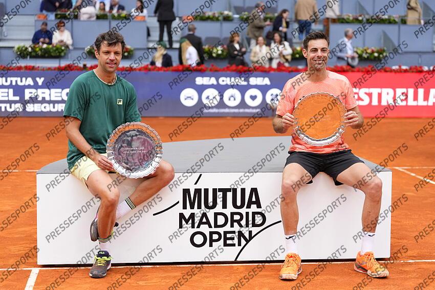 Horacio Zeballos of Argentina and Marcel Granollers of Spain pose with the winners trophies after winning against Marcelo Arevalo of El Salvador and Mate Pavic of Croatia during the Men Double’s Final of Mutua Madrid Open 2025 - ATP Masters 1000 celebrated at Caja Magica on May 03, 2025 in Madrid, Spain. FINALE MUTUA MADRID OPEN 