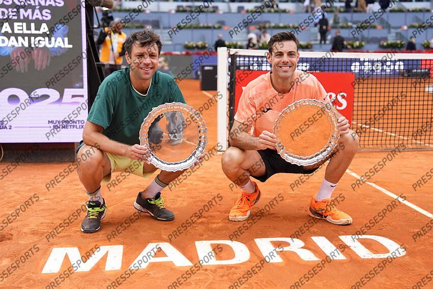 Horacio Zeballos of Argentina and Marcel Granollers of Spain pose with the winners trophies after winning against Marcelo Arevalo of El Salvador and Mate Pavic of Croatia during the Men Double’s Final of Mutua Madrid Open 2025 - ATP Masters 1000 celebrated at Caja Magica on May 03, 2025 in Madrid, Spain. FINALE MUTUA MADRID OPEN 