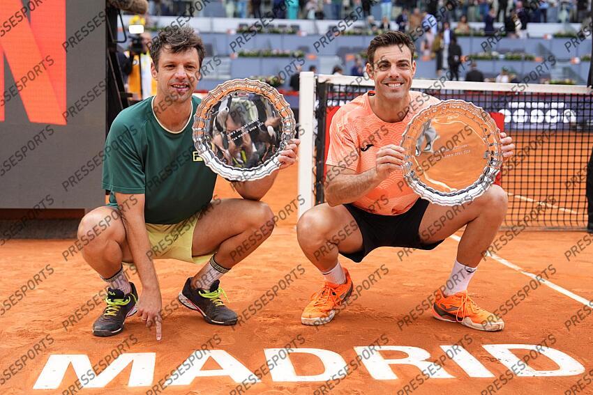 Horacio Zeballos of Argentina and Marcel Granollers of Spain pose with the winners trophies after winning against Marcelo Arevalo of El Salvador and Mate Pavic of Croatia during the Men Double’s Final of Mutua Madrid Open 2025 - ATP Masters 1000 celebrated at Caja Magica on May 03, 2025 in Madrid, Spain. FINALE MUTUA MADRID OPEN 