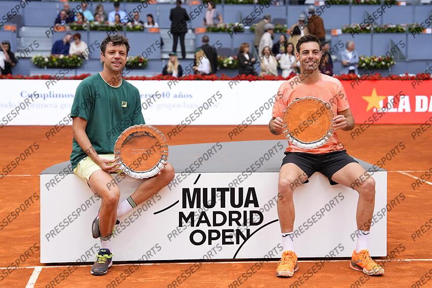 Horacio Zeballos of Argentina and Marcel Granollers of Spain pose with the winners trophies after winning against Marcelo Arevalo of El Salvador and Mate Pavic of Croatia during the Men Double’s Final of Mutua Madrid Open 2025 - ATP Masters 1000 celebrated at Caja Magica on May 03, 2025 in Madrid, Spain. FINALE MUTUA MADRID OPEN 