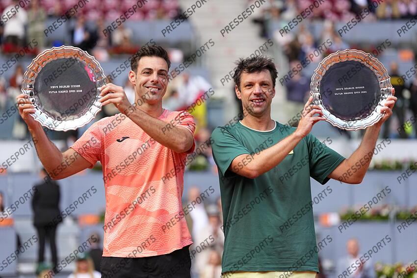 Horacio Zeballos of Argentina and Marcel Granollers of Spain pose with the winners trophies after winning against Marcelo Arevalo of El Salvador and Mate Pavic of Croatia during the Men Double’s Final of Mutua Madrid Open 2025 - ATP Masters 1000 celebrated at Caja Magica on May 03, 2025 in Madrid, Spain. FINALE MUTUA MADRID OPEN 