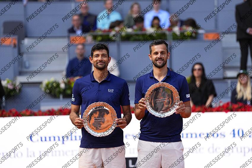 Marcelo Arevalo of Salvador and Mate Pavic of Croatia pose for a photo with their Men's Doubles Final winners trophies following their victory against Marcel Granollers of Spain and Horacio Zeballos of Argentina of Mutua Madrid Open 2025 - Masters 1000 tennis tournament celebrated at Caja Magica on May 03, 2025 in Madrid, Spain. FINALE MUTUA MADRID OPEN 