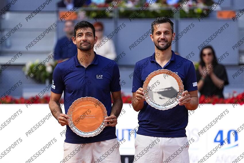 Marcelo Arevalo of El Salvador and Mate Pavic of Croatia pose with the second place trophies after losing against Horacio Zeballos of Argentina and Marcel Granollers of Spain during the Men Double’s Final of Mutua Madrid Open 2025 - ATP Masters 1000 celebrated at Caja Magica on May 03, 2025 in Madrid, Spain. FINALE MUTUA MADRID OPEN 