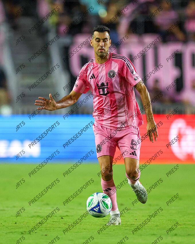 May 3, 2025; Fort Lauderdale, Florida, USA; IInter Miami CF midfielder Sergio Busquets (5) controls the ball against the New York Red Bulls in the first half at Chase Stadium. Mandatory Credit: Nathan Ray Seebeck-Imagn Images MLS: New York Red Bulls at Inter Miami CF 