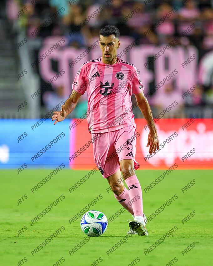 May 3, 2025; Fort Lauderdale, Florida, USA; IInter Miami CF midfielder Sergio Busquets (5) controls the ball against the New York Red Bulls in the first half at Chase Stadium. Mandatory Credit: Nathan Ray Seebeck-Imagn Images MLS: New York Red Bulls at Inter Miami CF 