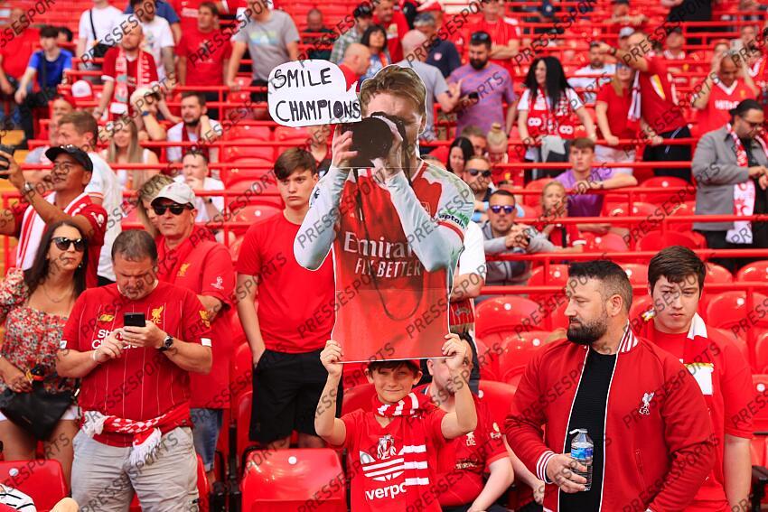 11th May 2025 - Premier League - Liverpool v Arsenal - A Liverpool fan holds up a placard mocking Martin Odegaard of Arsenal holding a camera - Photo: Simon Stacpoole / Offside. LIVERPOOL FC-ARSENAL (2-2) 