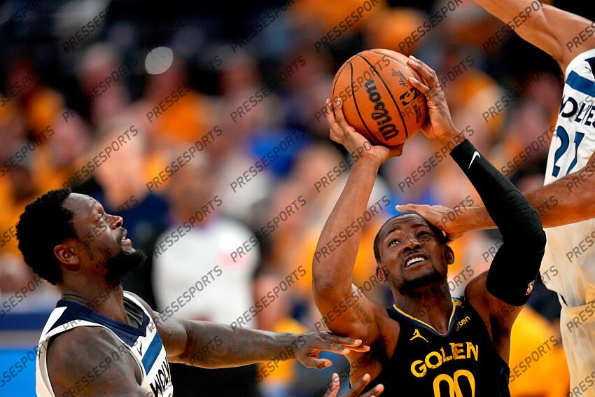May 12, 2025; San Francisco, California, USA; Golden State Warriors forward Jonathan Kuminga (00) is fouled while attempting a shot between Minnesota Timberwolves forward Julius Randle (30) and center Rudy Gobert (27) in the fourth quarter during game four of the second round for the 2025 NBA Playoffs at Chase Center. Mandatory Credit: Cary Edmondson-Imagn Images NBA: Playoffs-Minnesota Timberwolves at Golden State Warriors 