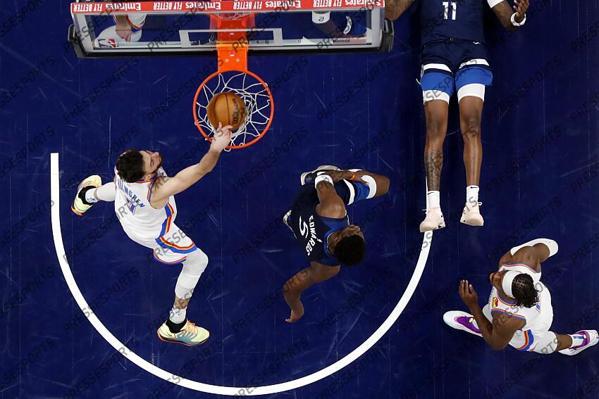 May 26, 2025; Minneapolis, Minnesota, USA;Oklahoma City Thunder forward Chet Holmgren (7) dunks the ball over Minnesota Timberwolves guard Anthony Edwards (5) during game four of the western conference finals for the 2025 NBA Playoffs at Target Center. Mandatory Credit: Bruce Kluckhohn-Imagn Images NBA: Playoffs-Oklahoma City Thunder at Minnesota Timberwolves 