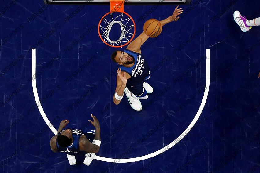 May 26, 2025; Minneapolis, Minnesota, USA; Minnesota Timberwolves center Rudy Gobert (27) jumps for a rebound against the Oklahoma City Thunder during game four of the western conference finals for the 2025 NBA Playoffs at Target Center. Mandatory Credit: Bruce Kluckhohn-Imagn Images NBA: Playoffs-Oklahoma City Thunder at Minnesota Timberwolves 