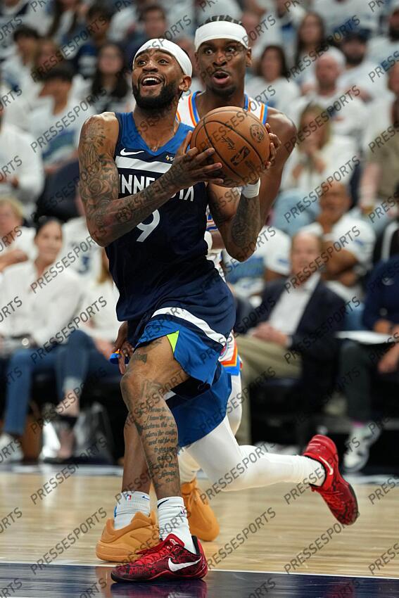 May 26, 2025; Minneapolis, Minnesota, USA; Minnesota Timberwolves guard Nickeil Alexander-Walker (9) dribbles the bal against the Oklahoma City Thunder in the second half during game four of the western conference finals for the 2025 NBA Playoffs at Target Center. Mandatory Credit: Jesse Johnson-Imagn Images NBA: Playoffs-Oklahoma City Thunder at Minnesota Timberwolves 