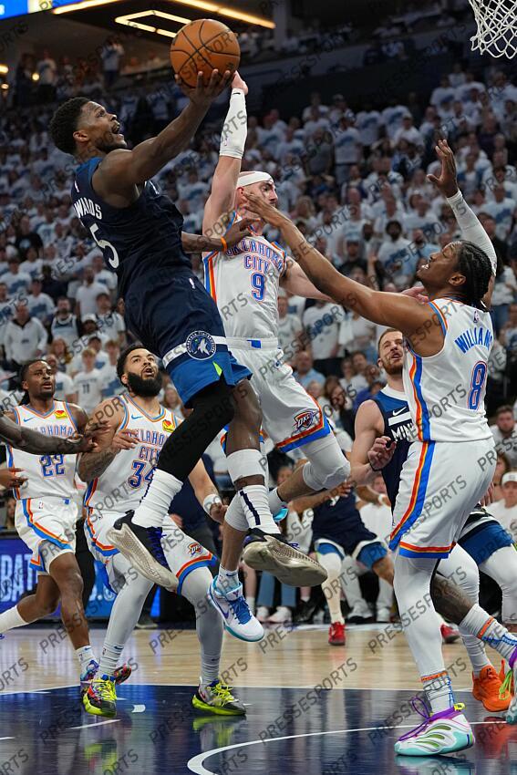 May 26, 2025; Minneapolis, Minnesota, USA;Minnesota Timberwolves guard Anthony Edwards (5) shoots the ball against Oklahoma City Thunder forward Jalen Williams (8) in the first half during game four of the western conference finals for the 2025 NBA Playoffs at Target Center. Mandatory Credit: Jesse Johnson-Imagn Images NBA: Playoffs-Oklahoma City Thunder at Minnesota Timberwolves 