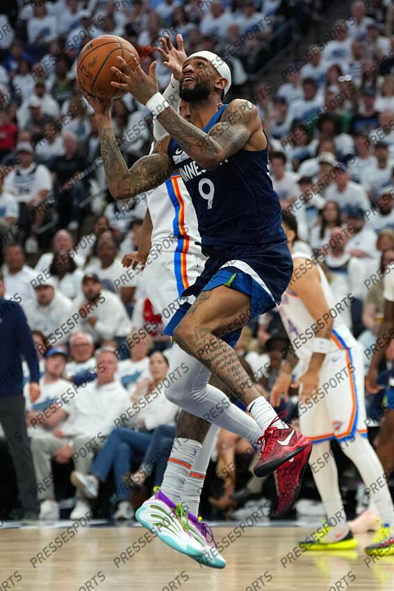 May 26, 2025; Minneapolis, Minnesota, USA; Minnesota Timberwolves guard Nickeil Alexander-Walker (9) shoots the ball against the Oklahoma City Thunder in the second half during game four of the western conference finals for the 2025 NBA Playoffs at Target Center. Mandatory Credit: Jesse Johnson-Imagn Images NBA: Playoffs-Oklahoma City Thunder at Minnesota Timberwolves 