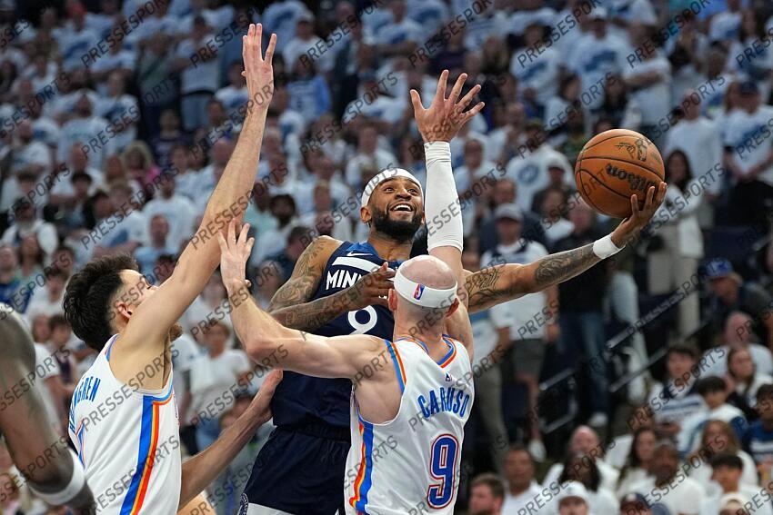 May 26, 2025; Minneapolis, Minnesota, USA; Minnesota Timberwolves guard Nickeil Alexander-Walker (9) shoots the ball over Oklahoma City Thunder guard Alex Caruso (9) in the second half during game four of the western conference finals for the 2025 NBA Playoffs at Target Center. Mandatory Credit: Jesse Johnson-Imagn Images NBA: Playoffs-Oklahoma City Thunder at Minnesota Timberwolves 
