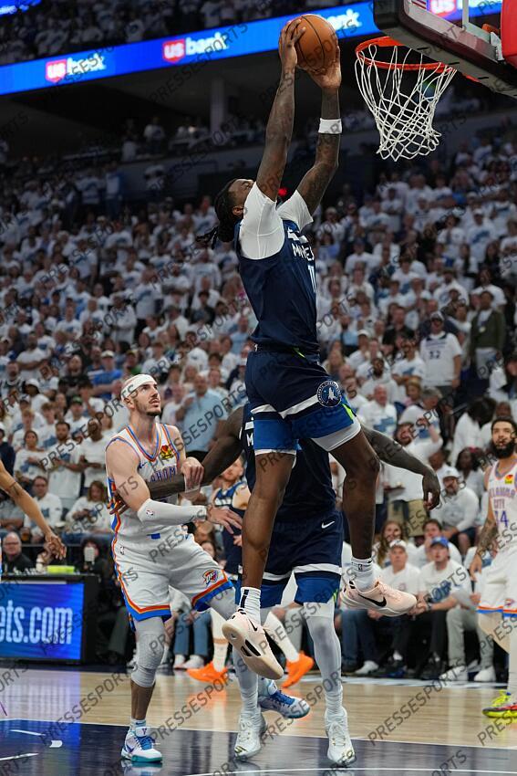 May 26, 2025; Minneapolis, Minnesota, USA; Minnesota Timberwolves center Naz Reid (11) dunks the ball against the Oklahoma City Thunder in the second half during game four of the western conference finals for the 2025 NBA Playoffs at Target Center. Mandatory Credit: Jesse Johnson-Imagn Images NBA: Playoffs-Oklahoma City Thunder at Minnesota Timberwolves 