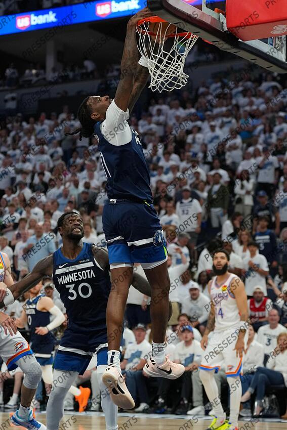 May 26, 2025; Minneapolis, Minnesota, USA; Minnesota Timberwolves center Naz Reid (11) dunks the ball against the Oklahoma City Thunder in the second half during game four of the western conference finals for the 2025 NBA Playoffs at Target Center. Mandatory Credit: Jesse Johnson-Imagn Images NBA: Playoffs-Oklahoma City Thunder at Minnesota Timberwolves 