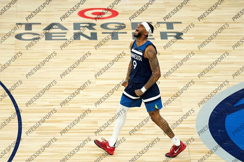May 26, 2025; Minneapolis, Minnesota, USA; Minnesota Timberwolves guard Nickeil Alexander-Walker (9) reacts against the Oklahoma City Thunder in the second half during game four of the western conference finals for the 2025 NBA Playoffs at Target Center. Mandatory Credit: Jesse Johnson-Imagn Images NBA: Playoffs-Oklahoma City Thunder at Minnesota Timberwolves 